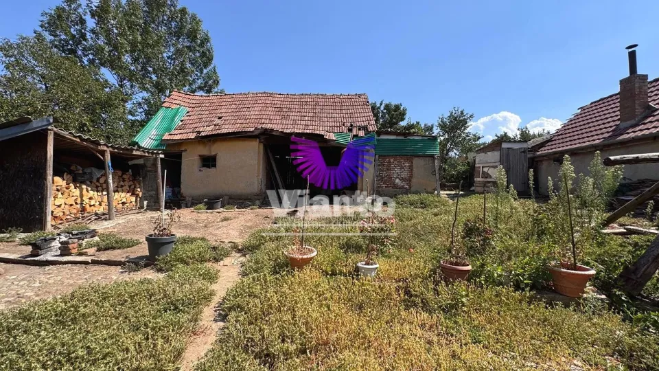 Haus mit zwei unabhängigen Gebäudeteilen und Grundstück 1050 m² zentral in Miercurea Sibiului